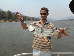 Fishing on Zambezi river for tiger fish and catfish